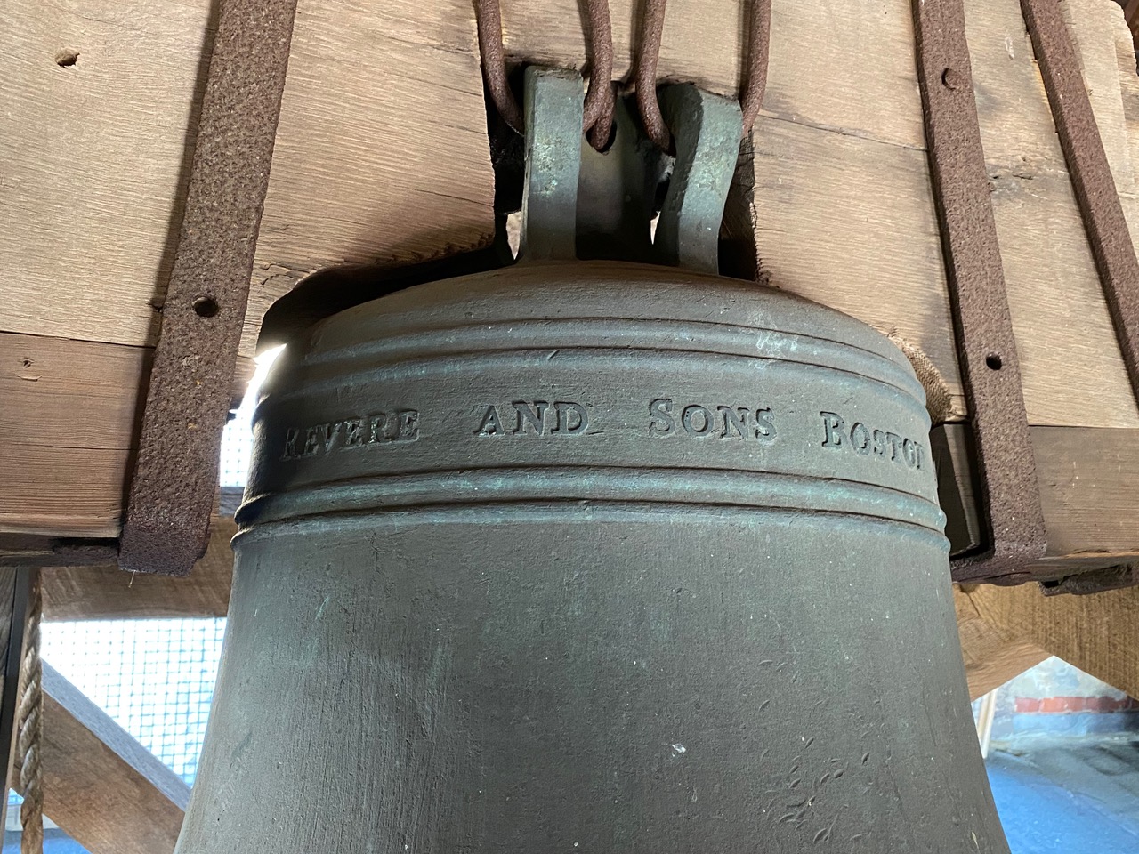 closeup view of bell showing inscription "Revere and Sons Boston"