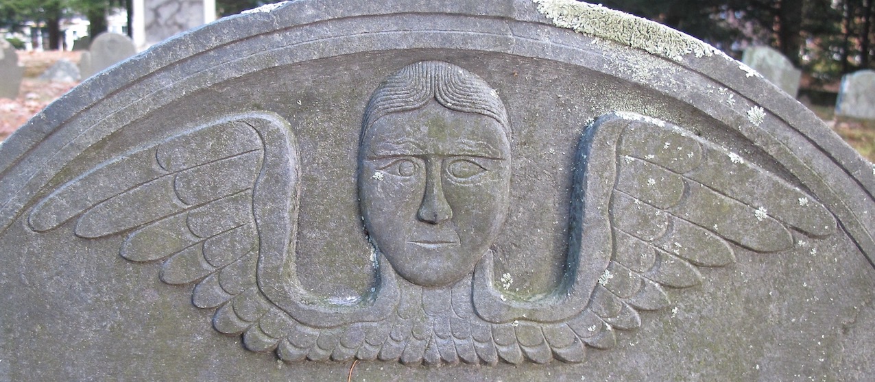 Detail of upper area of gravestone.