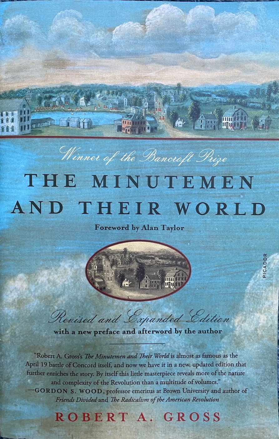 Cover of "The Minutemen and their World" with a painting of an Revolution-era New England town along the shore of a pond, with multiple groups of Redcoats in various parts of the scene.